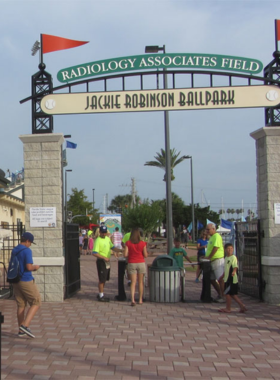 This image shows the Jackie Robinson Ballpark with its well-maintained baseball field, seating stands, and museum displays. The park honors Jackie Robinson’s legacy and celebrates sports history.