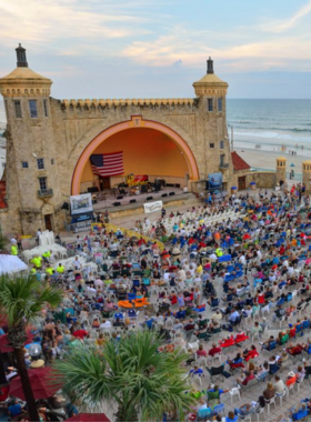 This image shows a cultural tour group visiting a historic landmark in Daytona Beach. The guide explains the site’s significance, while visitors explore the region’s rich heritage and architecture.