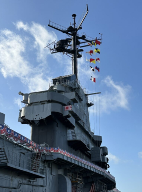 This image shows the USS Lexington, an aircraft carrier turned museum in Corpus Christi. Visitors can explore the flight deck, vintage planes, and historical exhibits while enjoying scenic bay views.