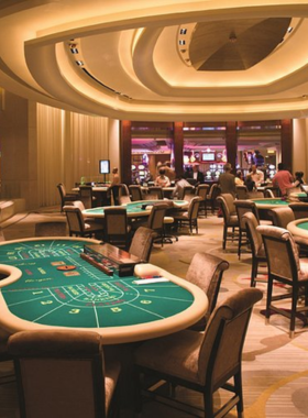 This image shows a bustling casino in Atlantic City, with bright lights, people playing slot machines, and a vibrant nightlife scene, offering an exciting environment for visitors to try their luck.