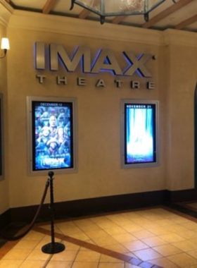 This image shows people watching a movie at the IMAX Theater in Atlantic City, with large screens and high-definition visuals offering an immersive cinematic experience for moviegoers.