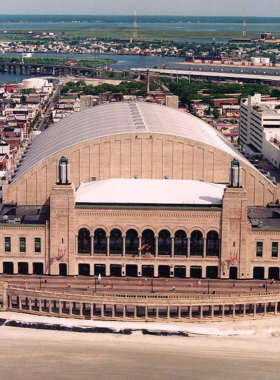  This image shows the historic Atlantic City Boardwalk Hall, with visitors admiring the stunning architecture of the building and learning about its history through exhibits and performances.