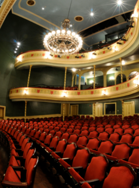 This image shows a live performance at Thalian Hall in Wilmington, a historic theater hosting plays, musicals, and live music, offering an incredible cultural experience for visitors.