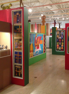 This image shows the Museum of International Folk Art, featuring a vast collection of folk art from around the world, highlighting global cultural traditions.