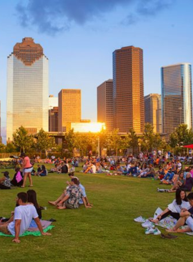 This image shows visitors walking and biking along the scenic trails of Buffalo Bayou Park in Houston. The park is a peaceful natural escape with views of the bayou, local wildlife, and beautiful green spaces.