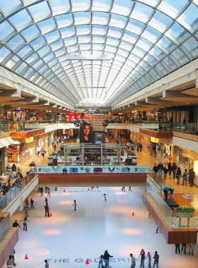 This image shows shoppers exploring The Galleria, Houston's largest shopping mall. With over 400 stores, dining options, and entertainment facilities like an ice rink, The Galleria is a must-visit for shopping enthusiasts and families alike.