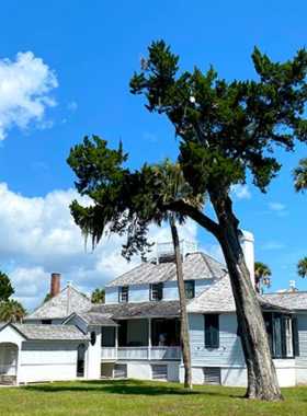 This image shows Kingsley Plantation within the Timucuan Ecological and Historical Preserve, with its well-preserved historical buildings and surrounding lush nature, offering insight into Florida's past.