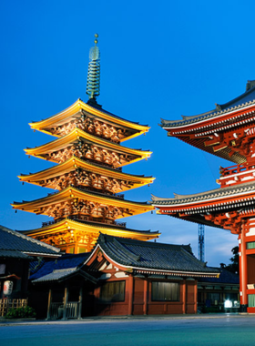 This image shows the historic Senso-ji Temple in Asakusa, surrounded by lanterns, traditional architecture, and vibrant crowds. Visitors explore the spiritual site, experiencing its cultural significance and peaceful ambiance in Tokyo.
