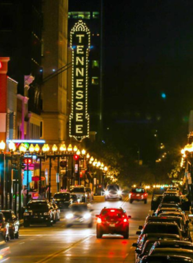 This image shows Gay Street in downtown Knoxville, lined with beautiful historic buildings, theaters, and bustling shops. The street is known for its lively atmosphere, especially during events and performances in the heart of the city.