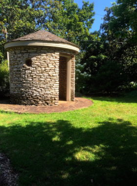 This image shows a beautifully landscaped rose garden at the Knoxville Botanical Gardens, with colorful blooms creating a peaceful and serene atmosphere. The gardens provide a perfect spot for nature lovers and those seeking tranquility in the city.