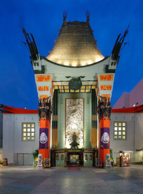 This image shows the Hollywood Walk of Fame’s stars on the sidewalk and the iconic TCL Chinese Theatre, rich with movie history.

