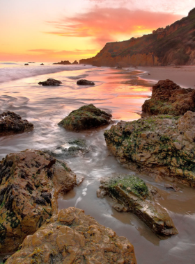 This image shows El Matador State Beach’s dramatic cliffs and tranquil coves at sunset, offering a perfect escape to nature.