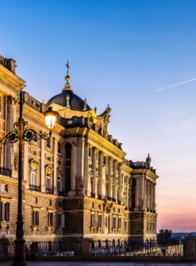  This image shows the Royal Palace of Madrid, an impressive Baroque-style palace that is the official residence of the Spanish Royal Family, featuring grand architecture and beautiful gardens.