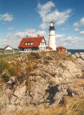 This image shows the Portland Head Light, one of Maine’s most iconic lighthouses. Located in Cape Elizabeth, it stands tall against the backdrop of the Atlantic Ocean, offering breathtaking coastal views.

