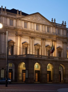 This image shows Teatro alla Scala, Milan’s iconic opera house known for its grand architecture and cultural significance. Visitors can attend performances or take tours to explore its rich history.