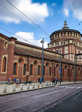 This image shows Santa Maria delle Grazie, a UNESCO World Heritage Site in Milan that houses The Last Supper. Its Renaissance architecture and peaceful ambiance make it a historical gem.