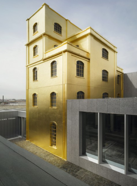 This image shows Fondazione Prada, a modern art museum in Milan located in a former gin distillery. The site features cutting-edge exhibitions and installations, offering a glimpse into contemporary Italian art.