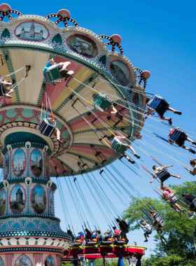  This image shows an exciting moment on a roller coaster at La Ronde amusement park, where visitors experience thrilling rides and family-friendly attractions during their visit to Montreal.