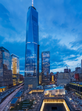  This image shows the twin reflecting pools at the National September 11 Memorial, marking the footprints of the Twin Towers. It is a place for reflection and remembrance of the 2001 terrorist attacks, commemorating those who lost their lives and offering a moving tribute.