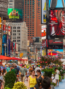 This image shows Times Square’s vibrant atmosphere, filled with neon lights, digital billboards, and bustling crowds. It's a major tourist destination for shopping, dining, and entertainment, showcasing the fast-paced energy of New York City.