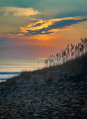  This image shows the lively Carolina Beach boardwalk, with colorful shops, arcades, and family-friendly attractions, offering a perfect blend of fun and relaxation.