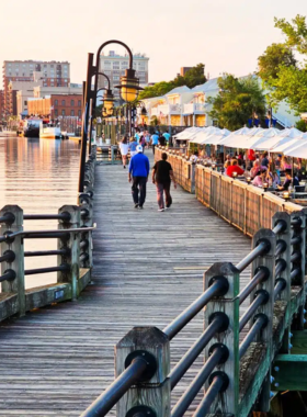 This image shows the historic district of Wilmington, featuring cobblestone streets, charming 19th-century architecture, and riverside views, perfect for a leisurely walk.