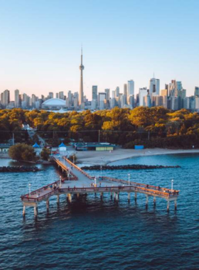  This image shows that the Toronto Islands are a peaceful getaway with beaches, bike trails, and scenic views of the city skyline, providing a natural escape from the hustle and bustle of downtown Toronto.