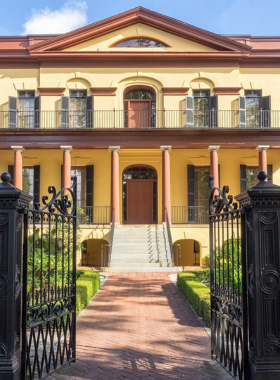 This image shows the Hampton-Preston Mansion, an antebellum home in Columbia. Visitors are exploring the historic mansion’s rooms and gardens, offering a glimpse into the city’s past with its architectural beauty.