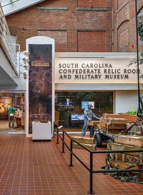 This image shows visitors touring the South Carolina Confederate Relic Room and Military Museum. It displays artifacts from the Civil War, offering a deep look at South Carolina’s military history and its role in the war.