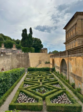 This image shows the scenic pathways of the Boboli Gardens, with beautifully manicured hedges and fountains. The Renaissance garden offers peaceful spaces and stunning views of Florence and the Tuscan countryside.