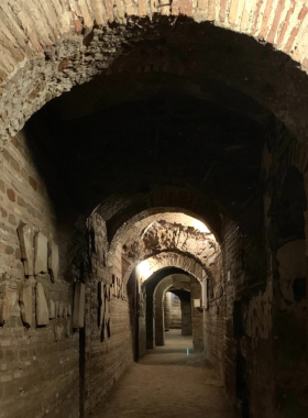 This image shows the Catacombs of Rome, ancient underground burial sites. These catacombs offer unique insights into early Christianity and Roman history, with popular sites like St. Callixtus and St. Sebastian.