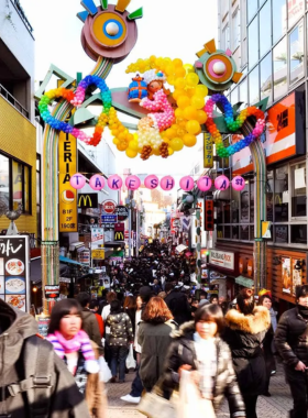 This image shows the vibrant and colorful street fashion of Harajuku, Tokyo, where young people express their unique styles through trendy outfits and creative accessories, creating a lively atmosphere in the area.