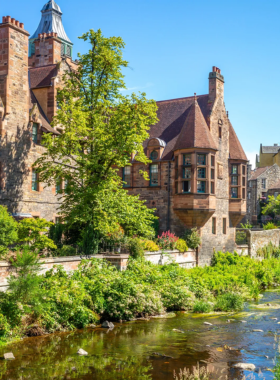  This image shows the Water of Leith walkway, a peaceful path alongside Edinburgh’s river, surrounded by lush greenery, calm waters, and historic landmarks like Dean Village for a scenic stroll.