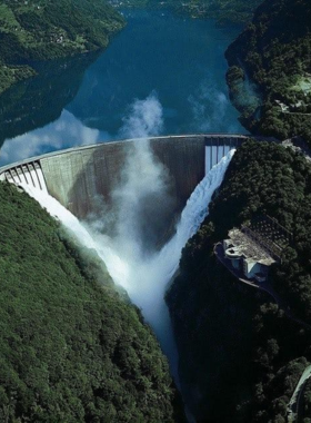 This image shows a thrilling bungee jump off the Contra Dam, offering an adrenaline rush with stunning views of the surrounding landscapes. The location is famous for being featured in the James Bond film GoldenEye.