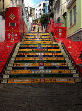 This image shows the colorful Escadaria Selarón, a staircase covered with vibrant mosaic tiles from around the world. The art-filled steps reflect the creativity and global connection in Rio de Janeiro’s Lapa neighborhood.