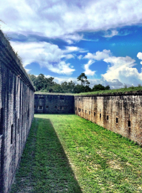 This image shows the historic Fort Barrancas in Pensacola, a military structure dating back to the 1800s. The photo captures the fort’s stone walls and lookout points, providing visitors with a glimpse into its role during the Civil War as a strategic defense for the area.