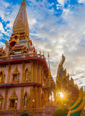 This image shows the serene Wat Chalong Temple, with its golden pagodas and intricate designs, making it one of Phuket’s most important spiritual sites.