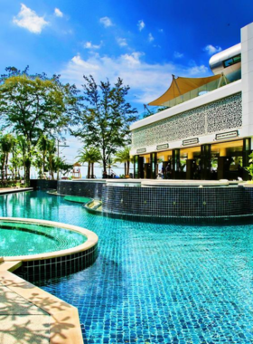 This image shows Phuket Graceland Resort and Spa, a family-friendly destination with luxurious amenities. The image features the resort's relaxing spa, well-equipped gym, and sustainable practices for a guilt-free vacation experience.