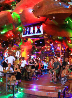 This image shows the iconic tiger-themed interiors of Tiger Nightclub on Bangla Road, Phuket. The cave-like design, bold tiger statues, and packed dance floors highlight the wild and adventurous vibe of this popular nightlife destination.