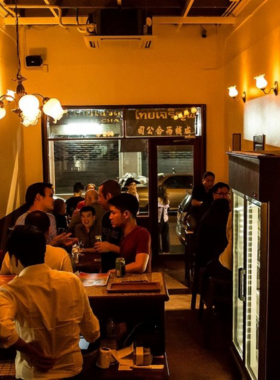 "This image shows Pijiu Bar, a hidden gem in Chinatown, Bangkok, serving local craft beers and tasty food, creating a chill atmosphere where you can unwind and enjoy unique brews."