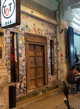 "This image shows Teens of Thailand, a stylish gin bar located in Chinatown, Bangkok, offering creative gin-based cocktails with unique infusions, perfect for a cozy and intimate drinking experience."