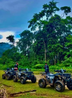 This image shows an exciting ATV ride through Chiang Mai's rugged terrains, surrounded by lush forests, and challenging off-road tracks, providing a thrilling adventure for all participants.