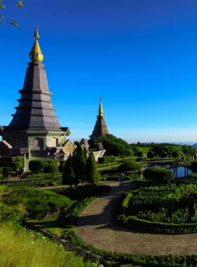 This image shows the scenic beauty of Doi Inthanon National Park, with hikers exploring lush forests, breathtaking waterfalls, and panoramic views from Thailand’s highest peak, providing an exhilarating adventure.