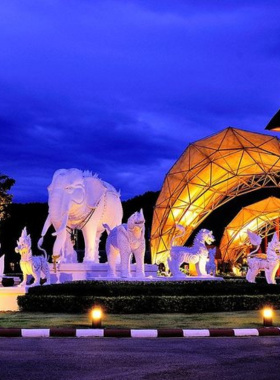 This image shows that Thapae Gate, an ancient brick structure in Chiang Mai, is bathed in the warm glow of sunrise, offering visitors a peaceful moment to enjoy the historic beauty and capture stunning photographs of this iconic landmark.