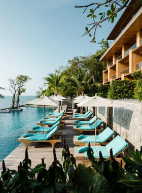  This image shows the stunning beachfront view at Cape Dara Resort in Pattaya, featuring its infinity pool overlooking the ocean. Guests can enjoy a tranquil atmosphere with spacious rooms, relaxing spa services, and fine dining options. Perfect for families, couples, and anyone seeking a peaceful and luxurious beach vacation in a beautiful tropical setting.