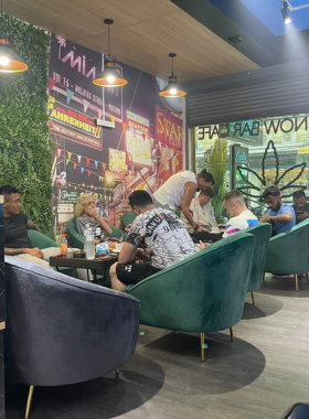 This image shows Exotics Pattaya 420 Café, featuring a relaxing environment with modern seating, friendly social vibes, and a unique cannabis-inspired atmosphere.