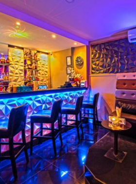 This image shows the stylish interior of KitCat Lounge Club in Pattaya, with comfortable seating, elegant decor, and a welcoming ambiance for casual meetups and relaxing evenings.