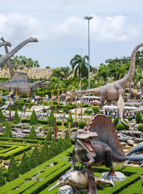 This image shows the lush greenery and colorful flowers of Nong Nooch Tropical Garden. The well-manicured landscapes, vibrant flowers, and exotic birds create a perfect backdrop for nature and wildlife photography enthusiasts.