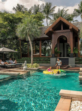  This image shows a private villa at Four Seasons Resort Koh Samui, featuring a luxurious pool with stunning beachfront views. The serene atmosphere and tropical surroundings highlight the ultimate luxury escape at this exclusive resort.