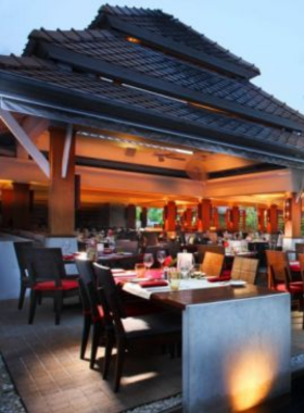 This image shows Prego Italian Restaurant in Koh Samui, with a comfortable and elegant dining setup. It captures wood-fired pizzas, creamy risottos, and handmade pastas served in a welcoming ambiance reminiscent of authentic Italian eateries.